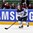 MINSK, BELARUS - MAY 10: Finland's Juuso Hietanen #38 skates with the puck as the Latvian bench looks on during preliminary round action at the 2014 IIHF Ice Hockey World Championship. (Photo by Andre Ringuette/HHOF-IIHF Images)


